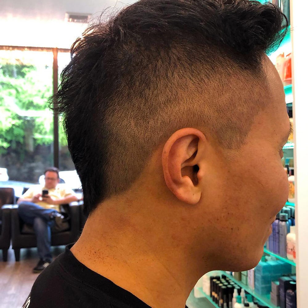 men's styled haircut with volume at Numi Hair Salon