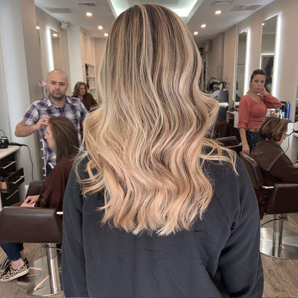 woman with short haircut after commuting from Mamaroneck to numi hair salon in scarsdale