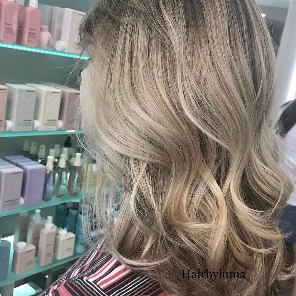 happy client from pleasantville at numi hair salon in scarsdale