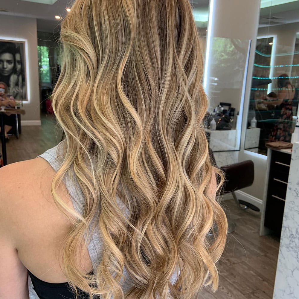 happy client from yorktown at numi hair salon in scarsdale