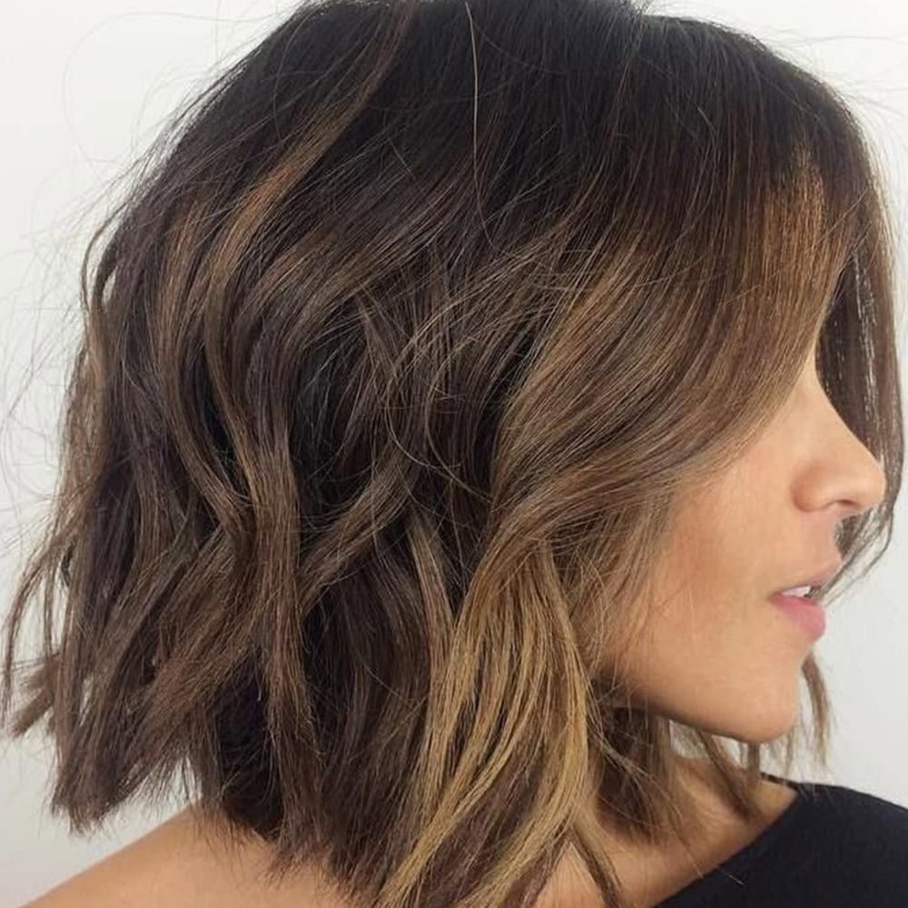 woman with short haircut after commuting from briarcliff manor to numi hair salon in scarsdale