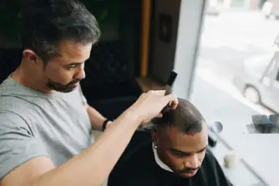 Buzz cut for thinning hair, a short clipper cut suited to a barbershop or salon