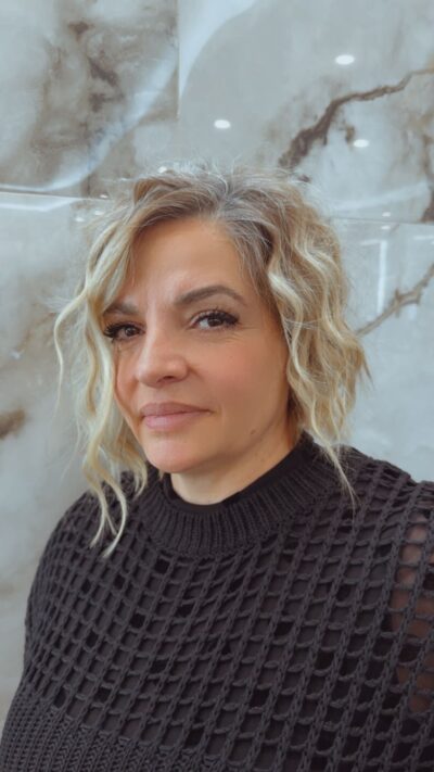 Luma hair stylist at Numi Hair Salon in Scarsdale NY