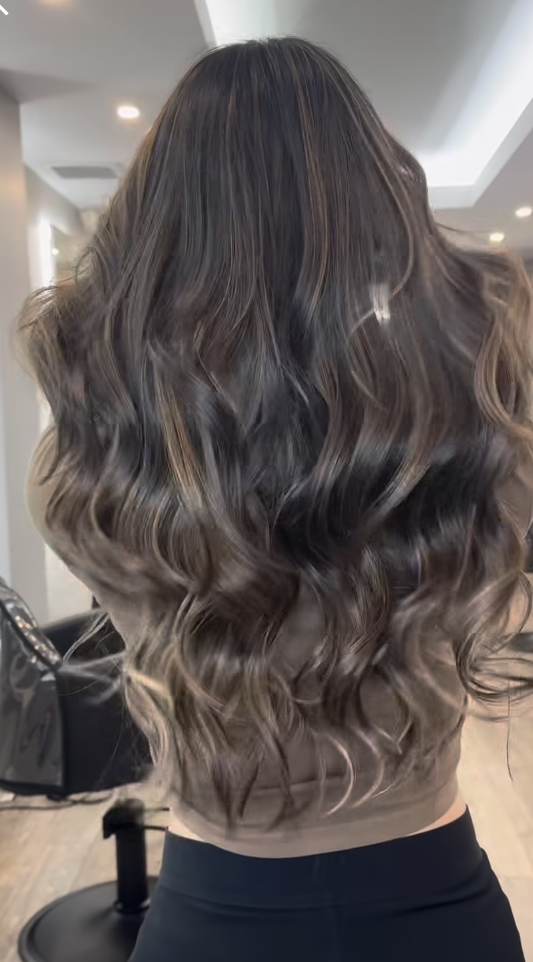 happy client from pound ridge ny at numi hair salon in scarsdale