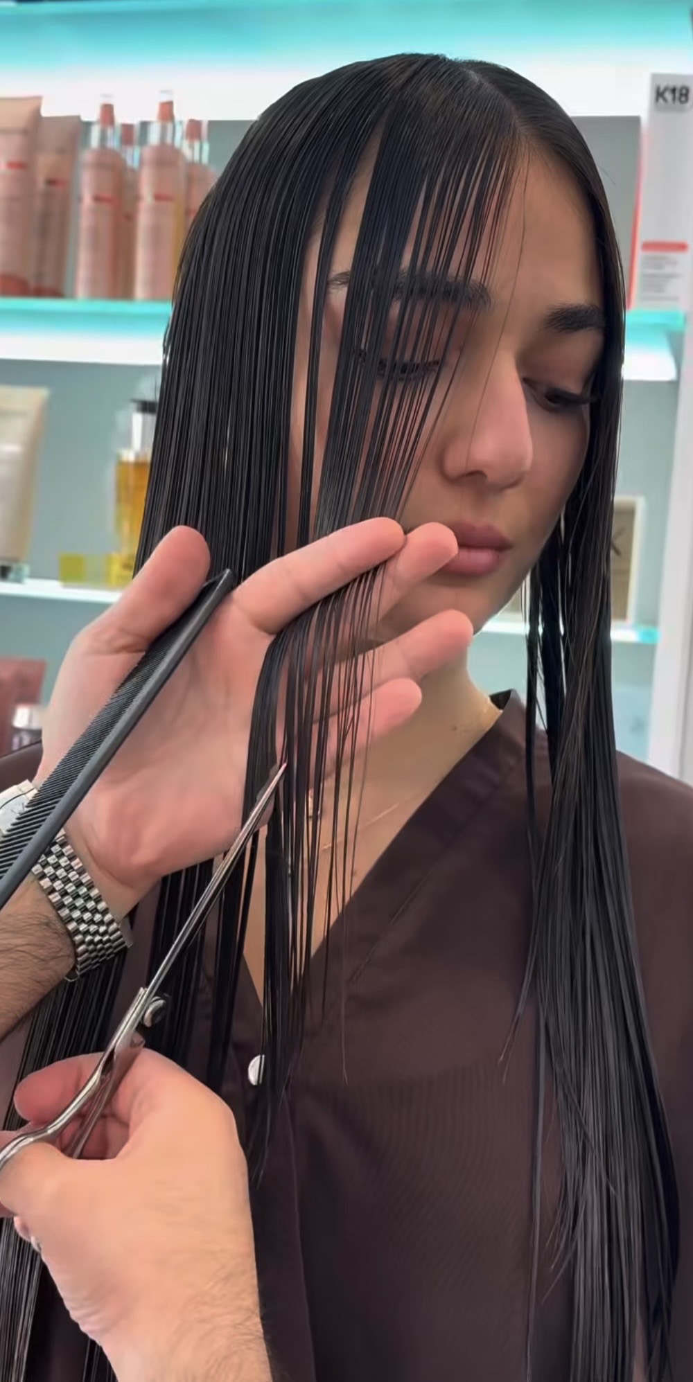 happy client from lewisboro ny getting haircut at numi hair salon in scarsdale