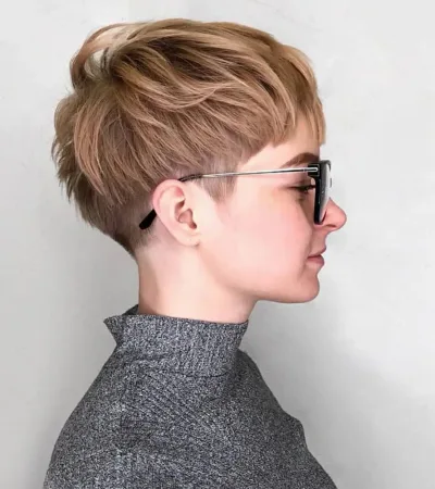 bixie haircut side profile showing textured layers with cropped sides